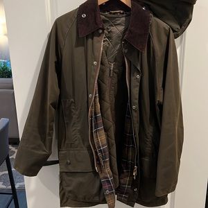 This is a Barbour - Classic Beaufort wax jacket in classic loden green